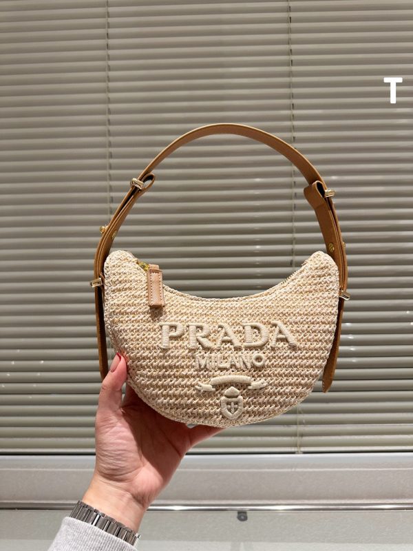 PRDA wicker and leather argué bag